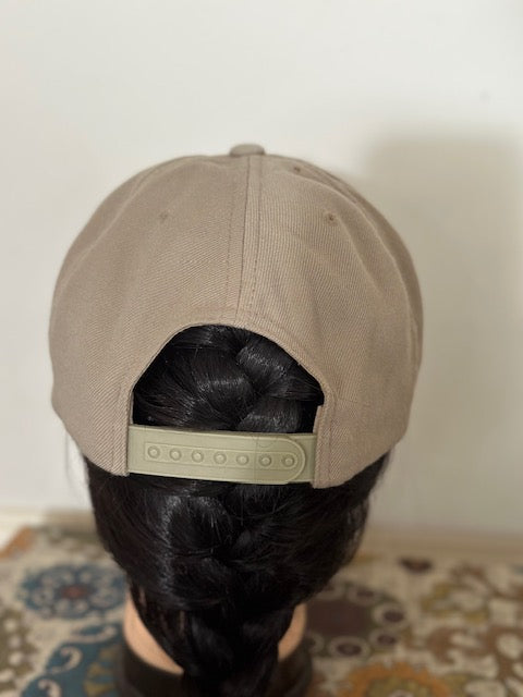 Beige Hat  patch on front .